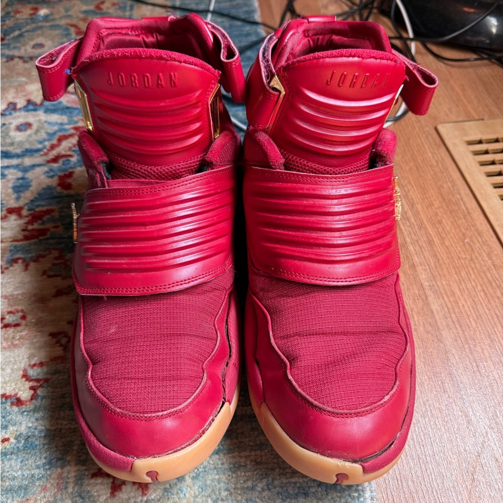 Jordan Maroon High-Top Sneakers with Gold Accents
